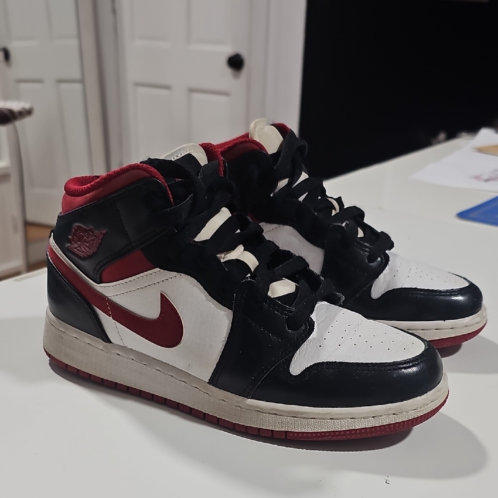 Nike Air Jordan Black, White, and Red Sneakers